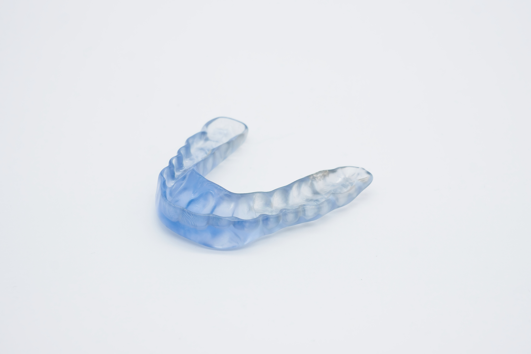 Transparent dental night guard protecting teeth grinding